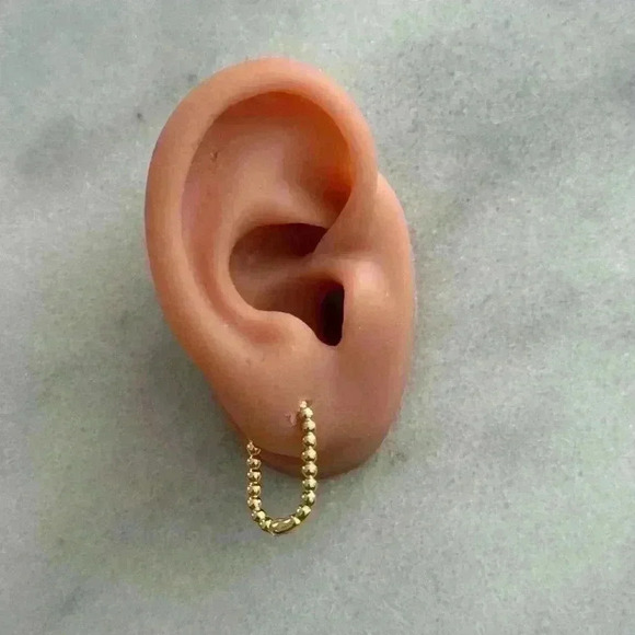 Gold Beaded Oval Hoop Earrings
Brand New - Picture 2 of 3